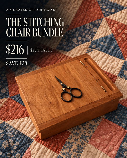 Wooden Stitcher's Lap Desk with Moon Flower scissors in The Stitching Chair Bundle on a patchwork quilt.